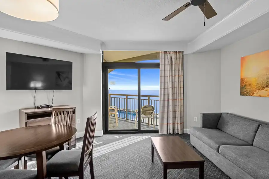 Living area opening to the private ocean-view balcony