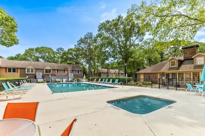Outdoor community swimming pool and surrounding deck