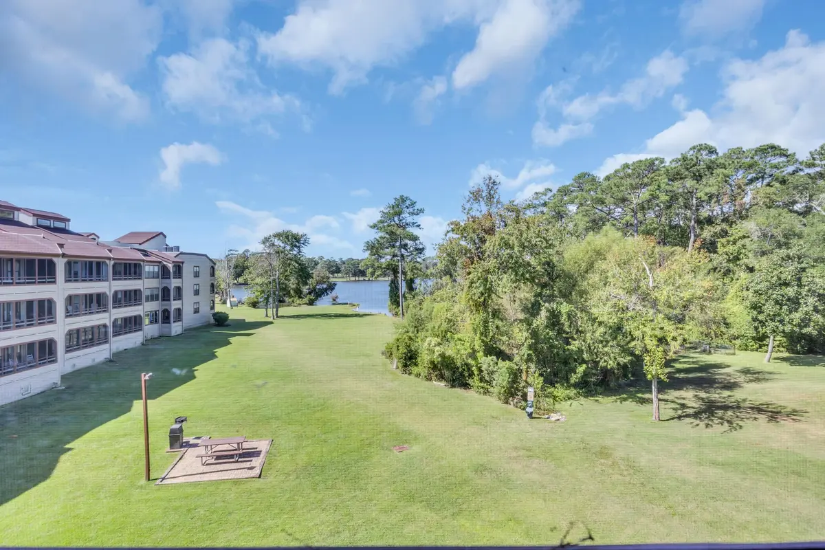 View from the condominium toward the lawn and pond