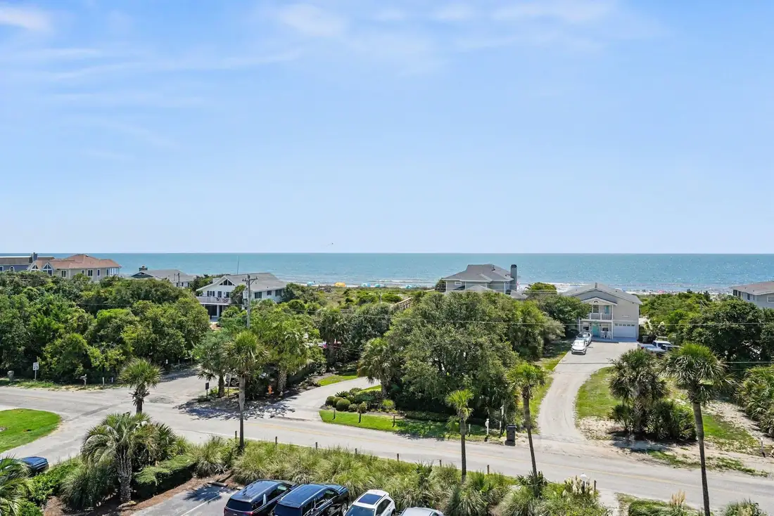 Ocean and beach view including the nearby walkway and dune line