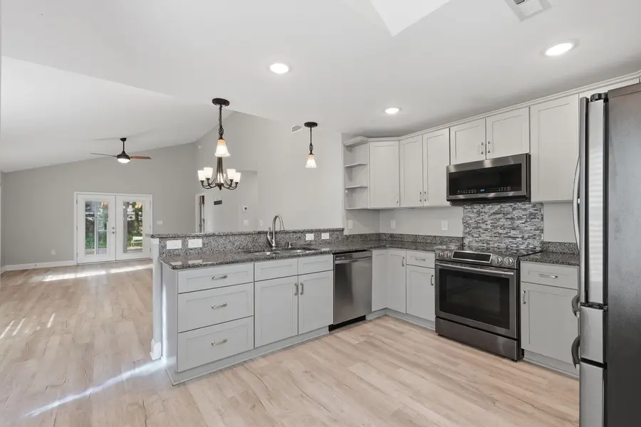 Open kitchen and breakfast-bar peninsula