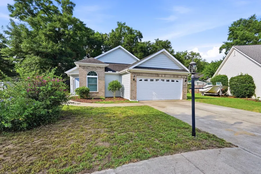 Front exterior and attached two-car garage